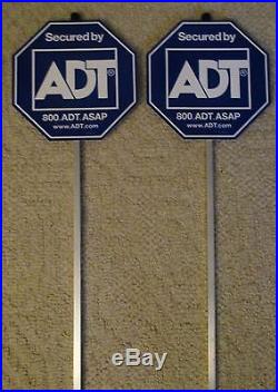 Two Blue Plastic Aluminum ADT Yard Lawn Signs